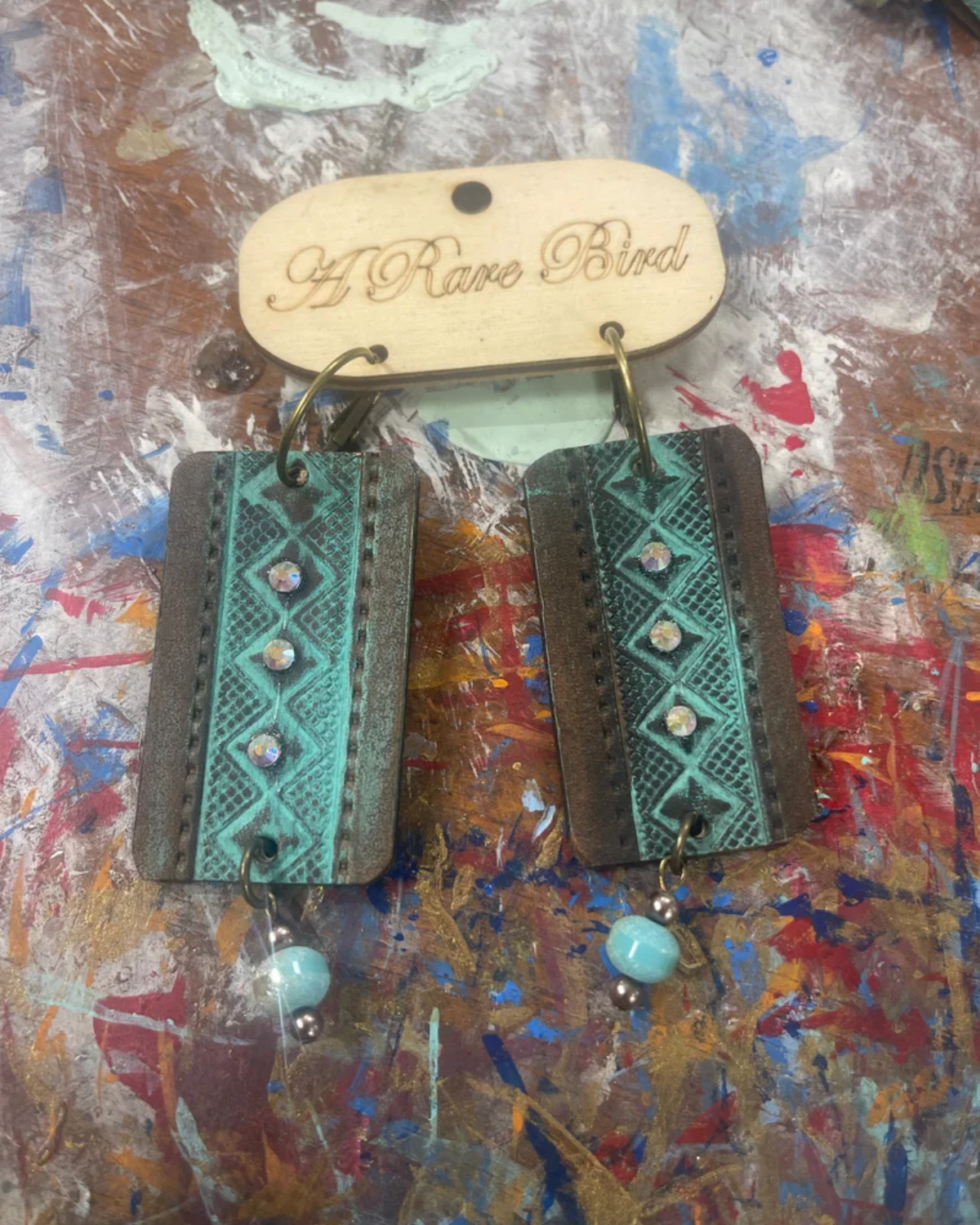 Hand tooled Leather Earring with Bead